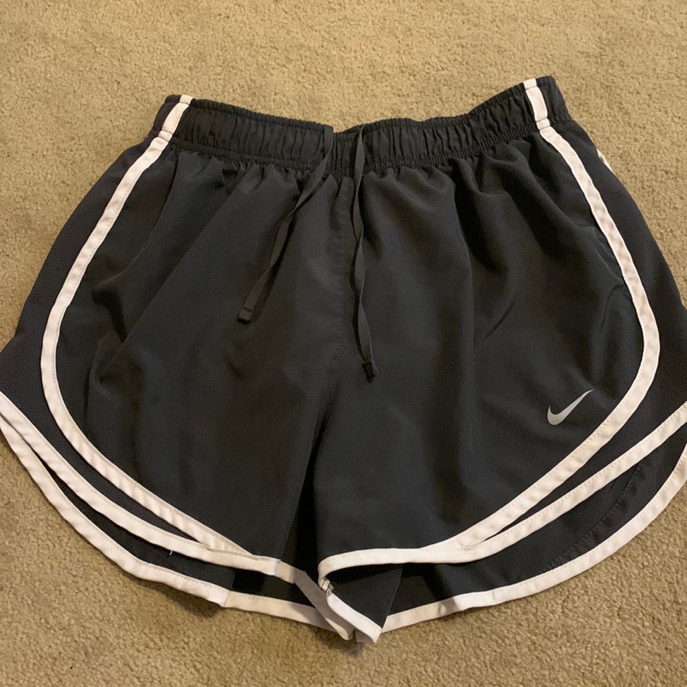 grey and white nike dri fit running shorts